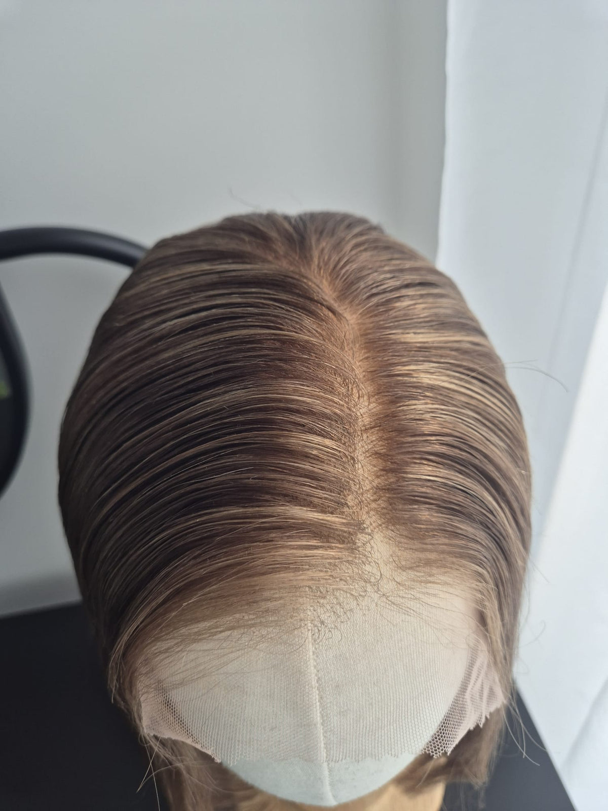 Closeup of a human hair wig hairline